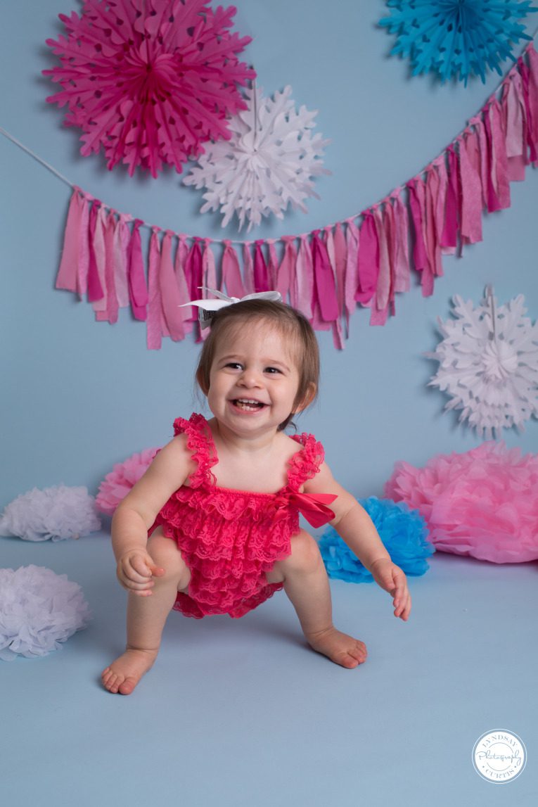 Portrait photographer Lyndsay Curtis photographs one year old Parker Smith at her blue and pink cake smash session in-studio in Sigonella | www.lyndsaycurtis.com