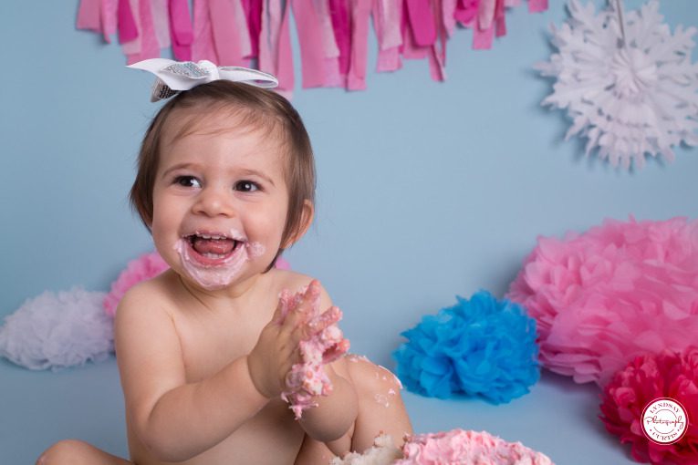 Portrait photographer Lyndsay Curtis photographs one year old Parker Smith at her blue and pink cake smash session in-studio in Sigonella | www.lyndsaycurtis.com