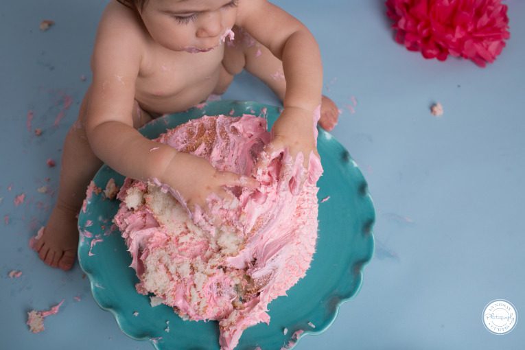 Portrait photographer Lyndsay Curtis photographs one year old Parker Smith at her blue and pink cake smash session in-studio in Sigonella | www.lyndsaycurtis.com