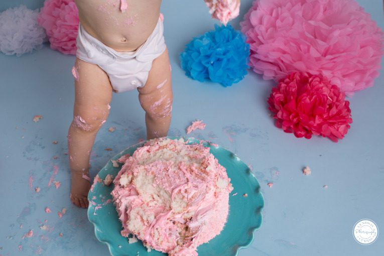 Portrait photographer Lyndsay Curtis photographs one year old Parker Smith at her blue and pink cake smash session in-studio in Sigonella | www.lyndsaycurtis.com