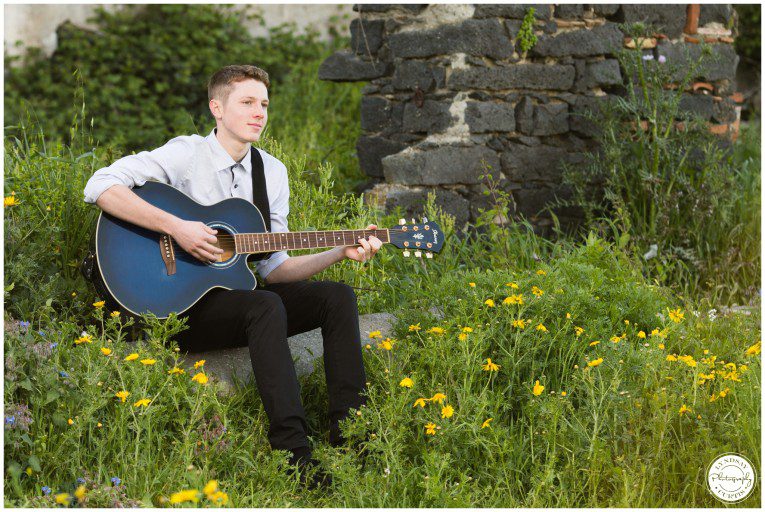 Portrait photographer Lyndsay Curtis photographs Class of 2015 Senior Zane with his guitar in Sicily, Italy | www.lyndsaycurtis.com