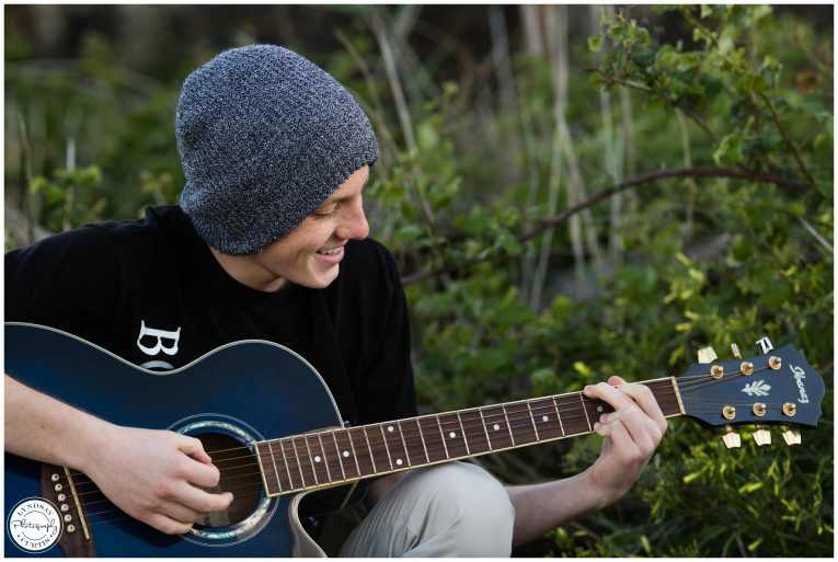 Portrait photographer Lyndsay Curtis photographs Class of 2015 Senior Zane with his guitar in Sicily, Italy | www.lyndsaycurtis.com