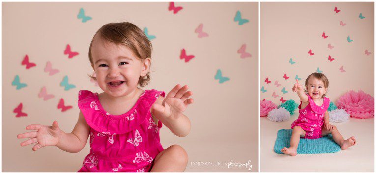 Portrait photographer Lyndsay Curtis photographs 1 year old birthday girl Campbell in her home studio during a pink, blue and purple cake smash session. | www.lyndsaycurtis.com