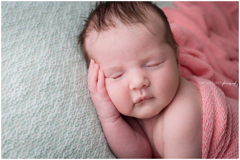 Newborn photographer Lyndsay Curtis photographs 2 week old Kaden Lynn in her home portrait studio. | www.lyndsaycurtis.com
